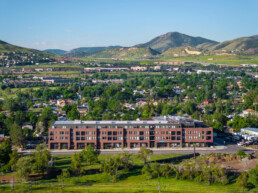 An aerial view of the GW Apartment building featuring the surrounding Golden, CO community